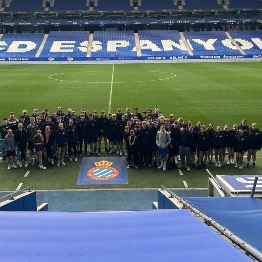 group photo of students at Espanyol stadium